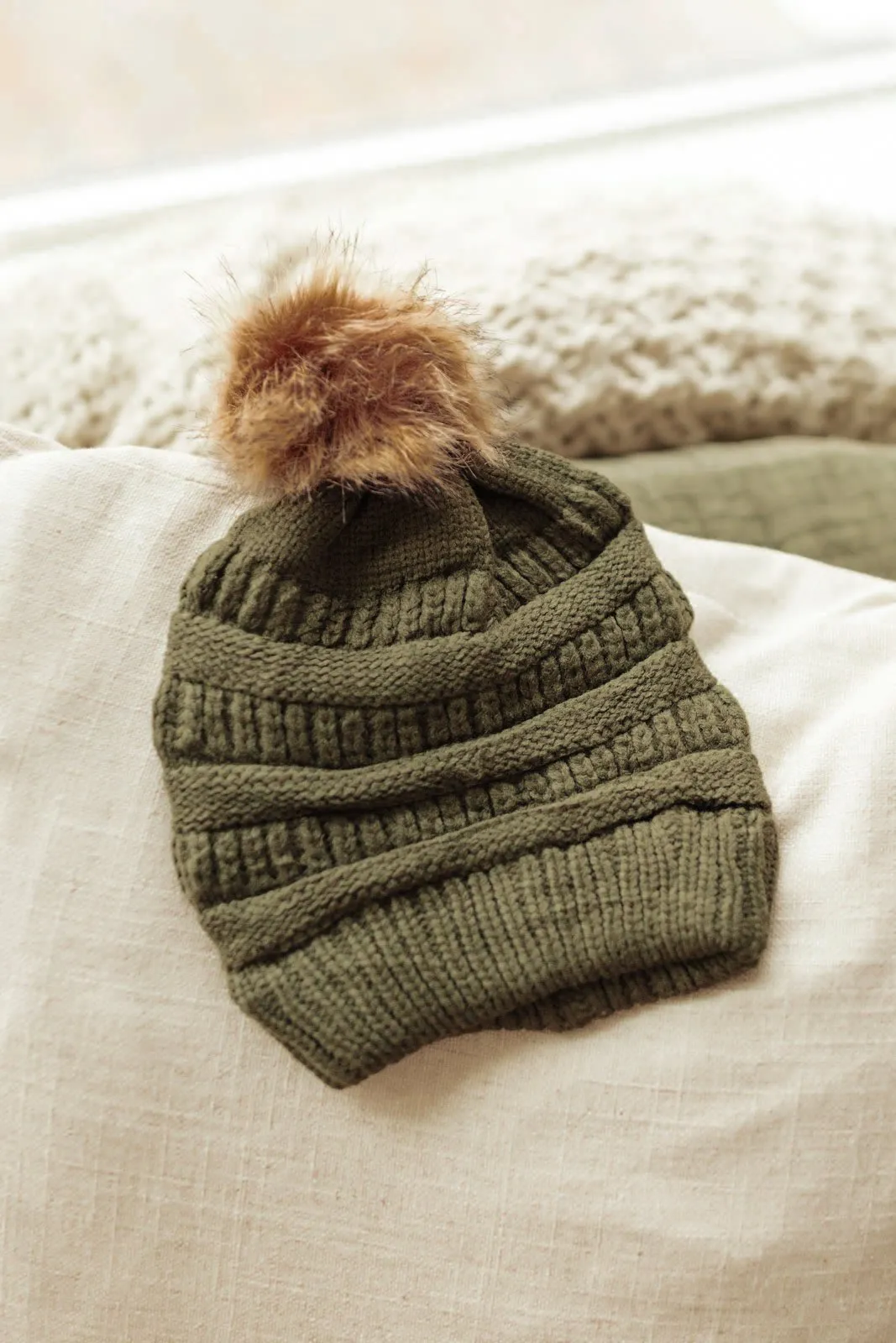 Faux Fur Pom Pom Beanie In Olive
